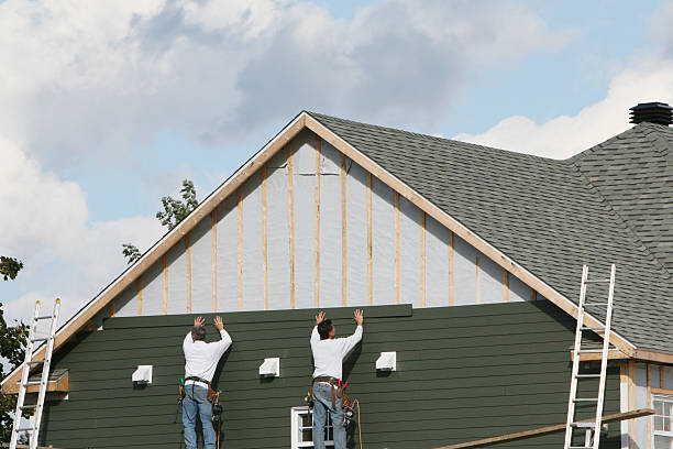 Professional Siding Contractor technician working in Dover, PA